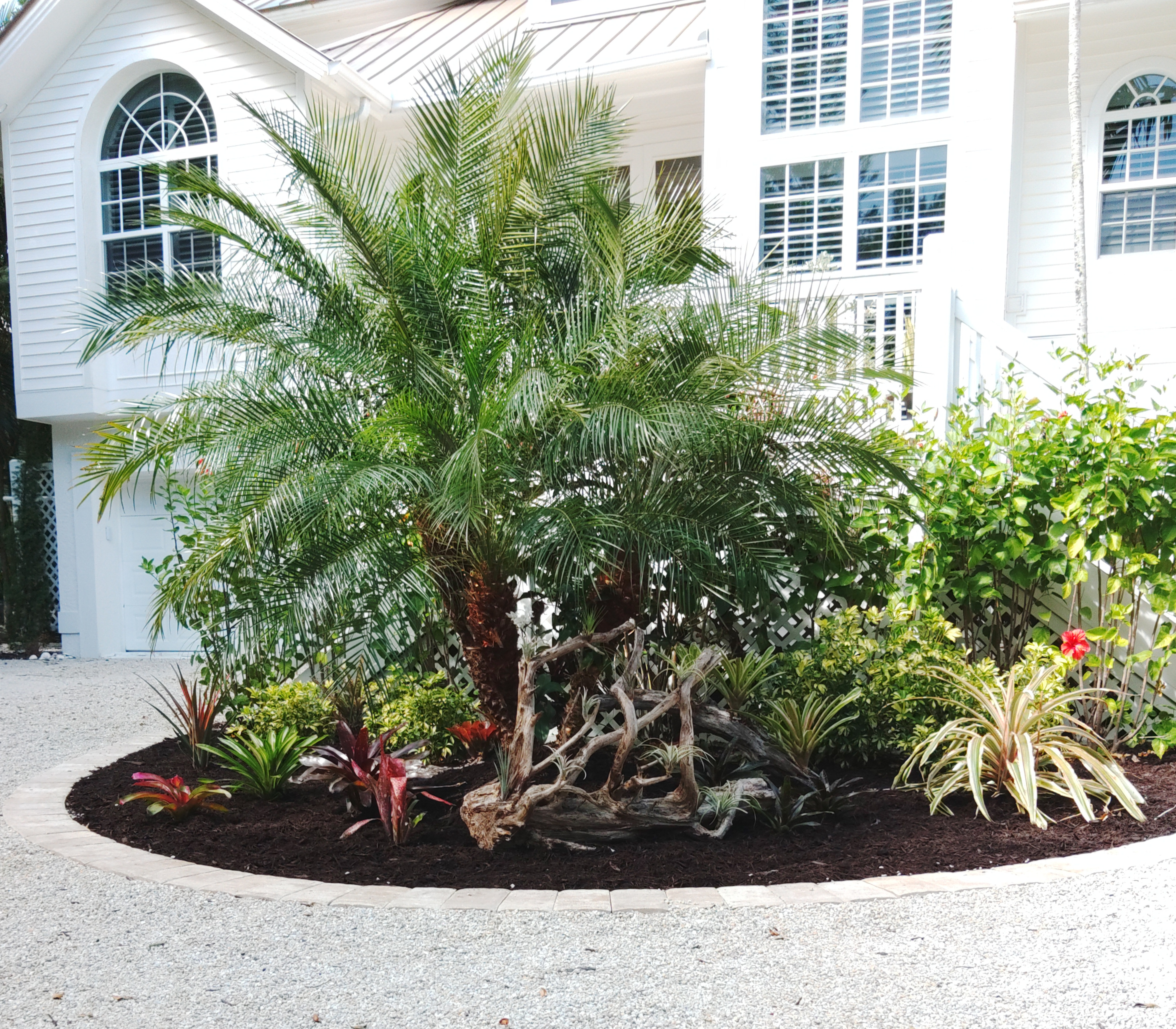 A beautifully completed landscaping job in front of a customer's house